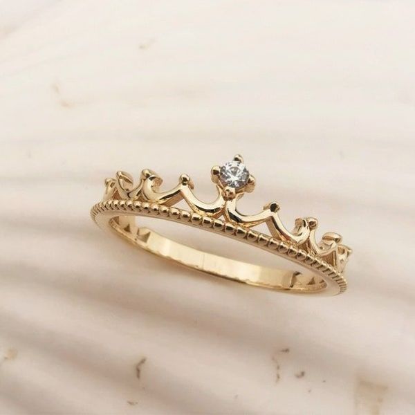 Top luxurious gold crown ring designs for women